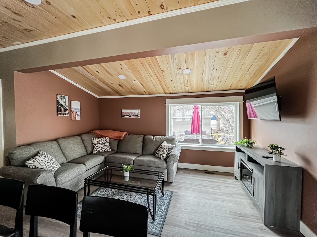 The Hidden Gem — Main Level Living Room (full size sofa bed) with TV with Amazon Firestick and electric fireplace.